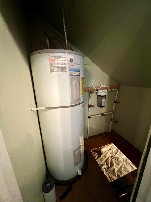 utility room featuring electric water heater