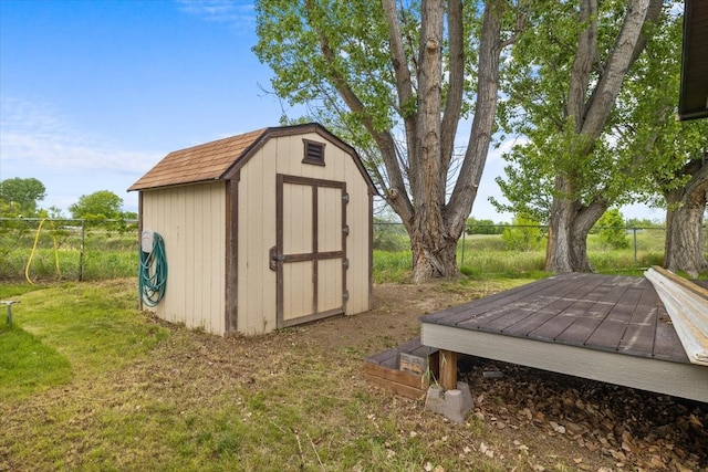 view of outdoor structure with a yard