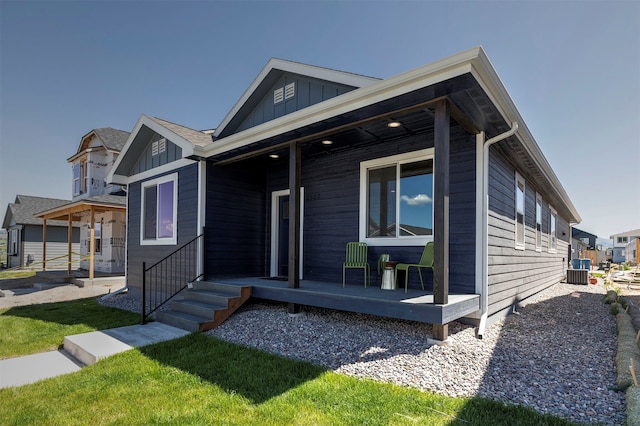 view of front of house featuring central AC unit and covered porch