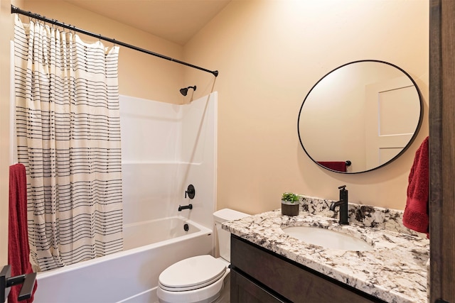 full bathroom with vanity, toilet, and shower / tub combo