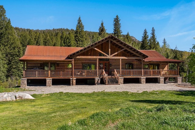 log home featuring a front yard