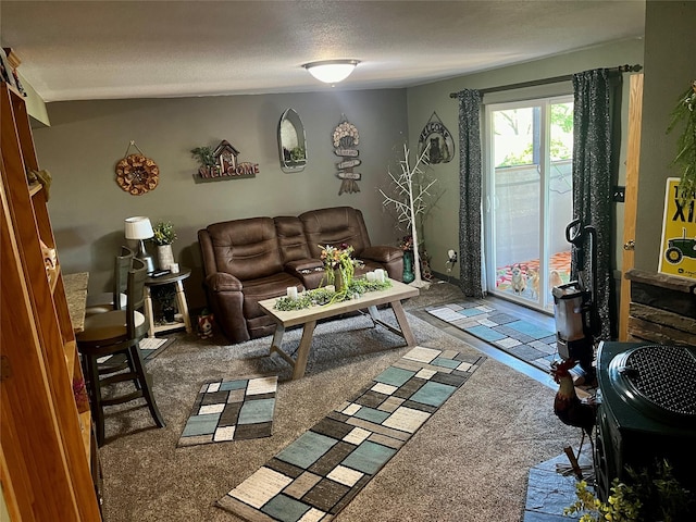 carpeted living room with a textured ceiling