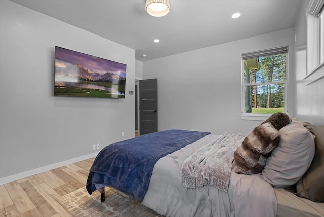 bedroom featuring hardwood / wood-style floors