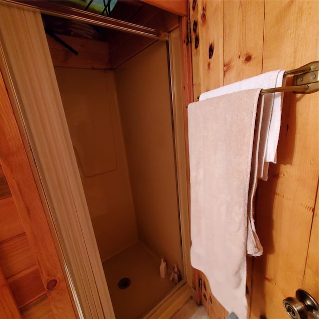 15426 Steamboat Dr, Augusta, MT 59410 - full bathroom featuring wooden walls and a shower stall