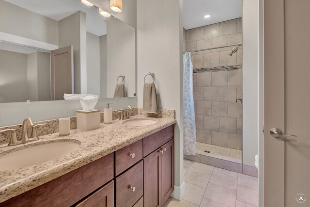 bathroom featuring vanity, tile patterned floors, toilet, and a shower with shower curtain