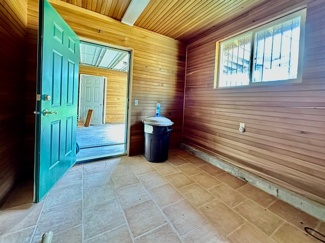 interior space with wooden walls and wood ceiling