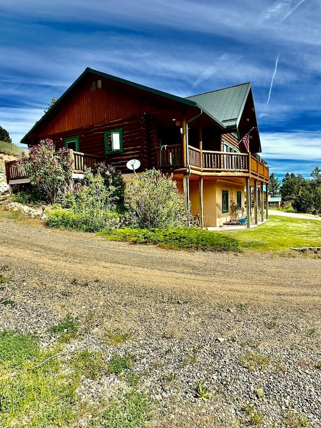 view of front of home with a deck