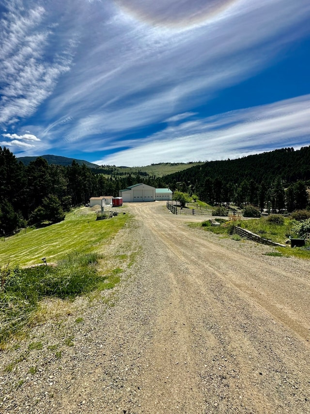 view of road featuring a rural view