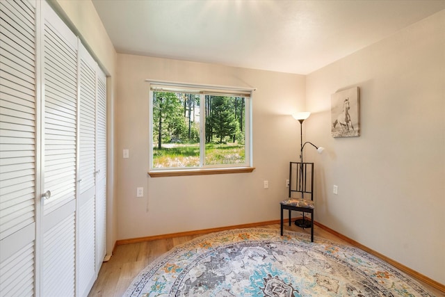 sitting room featuring hardwood / wood-style floors