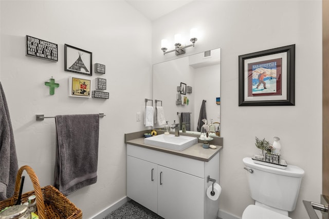 281 Blackberry Loop Unit A, Whitefish, MT 59937 - bathroom featuring vanity, toilet, and baseboards