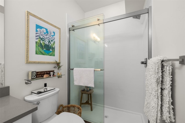 281 Blackberry Loop Unit A, Whitefish, MT 59937 - bathroom with toilet, vanity, and a stall shower