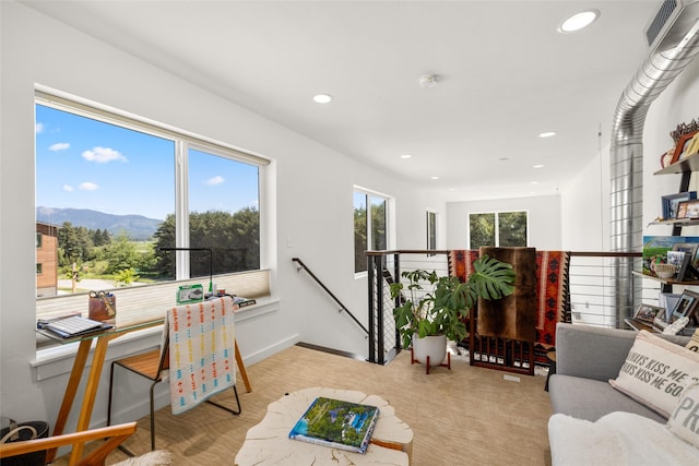 281 Blackberry Loop Unit A, Whitefish, MT 59937 - living room featuring a mountain view and recessed lighting