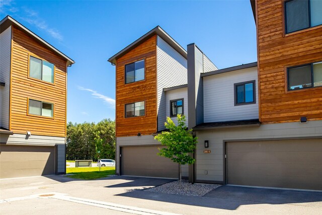 281 Blackberry Loop Unit A, Whitefish, MT 59937 - view of front of property with a garage