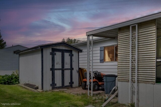 exterior space featuring a storage shed