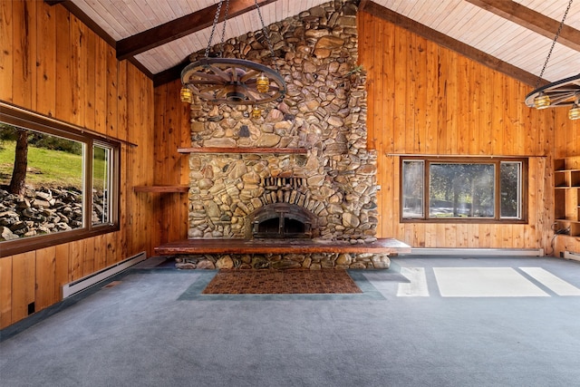 unfurnished living room featuring carpet, wooden walls, high vaulted ceiling, baseboard heating, and wood ceiling