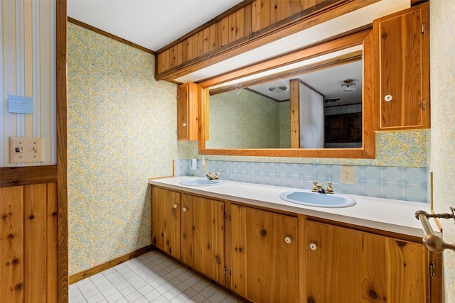 bathroom featuring tile flooring, backsplash, and double sink vanity