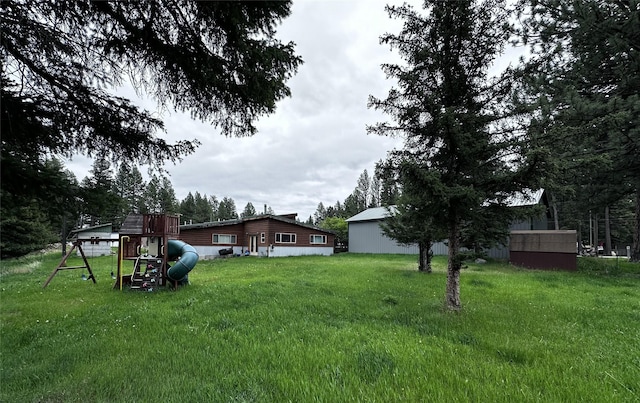 view of yard with a playground