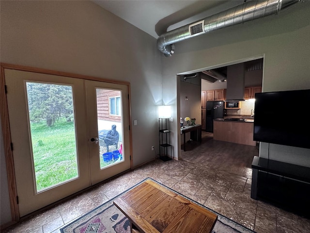 interior space with french doors and sink