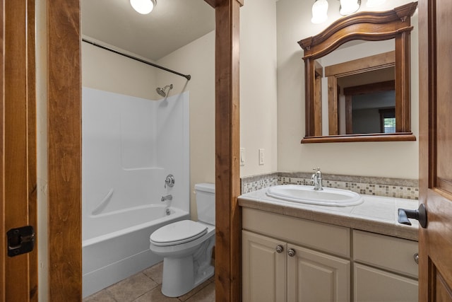 full bathroom with tile patterned flooring, vanity, shower / bath combination, and toilet