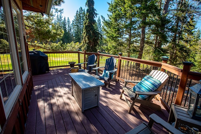 wooden deck with area for grilling