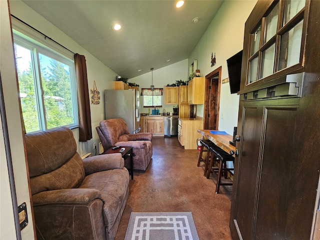 living room with lofted ceiling, concrete floors, and recessed lighting