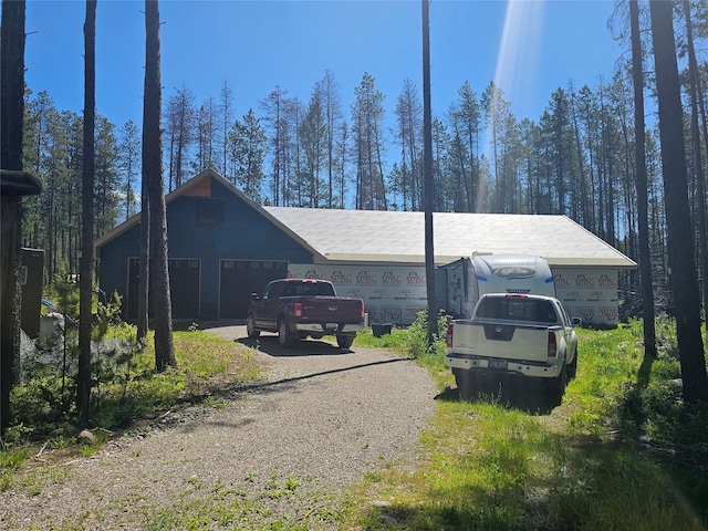 view of property exterior with driveway