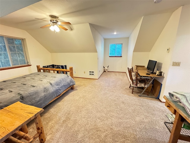 bedroom with light carpet, ceiling fan, and lofted ceiling