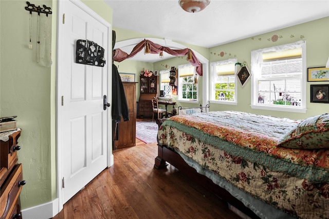 bedroom featuring hardwood / wood-style flooring