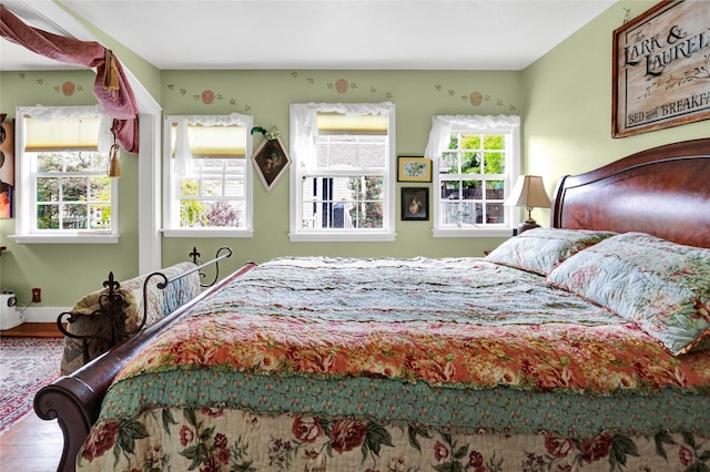 bedroom featuring hardwood / wood-style flooring