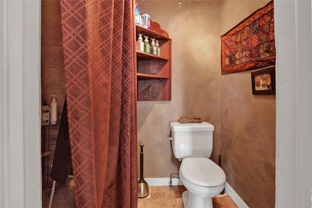 bathroom featuring toilet