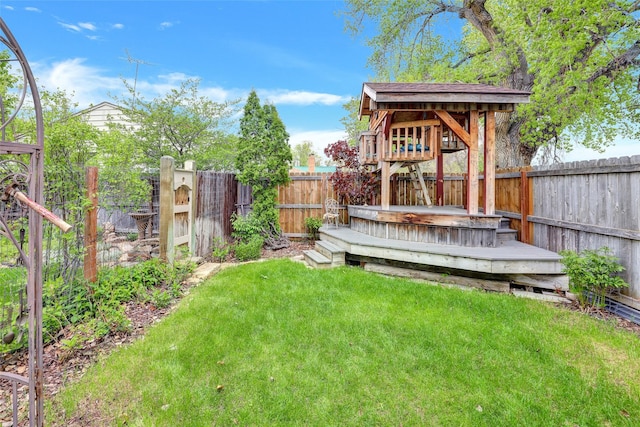 view of yard featuring a deck