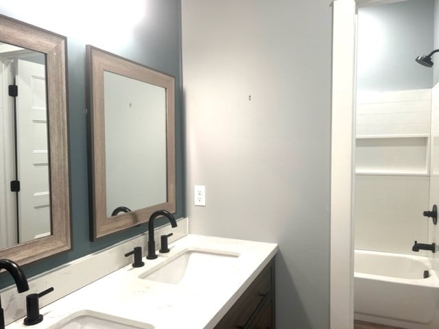 bathroom with vanity and shower / bathtub combination