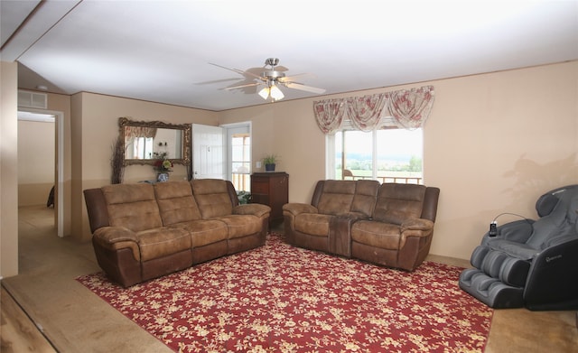 misc room featuring ceiling fan and light carpet