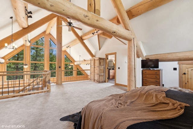 carpeted bedroom with beam ceiling and high vaulted ceiling