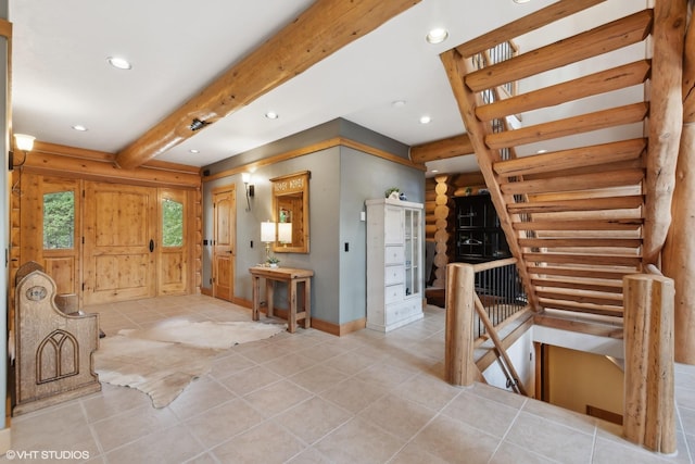 kitchen with light tile patterned flooring and beam ceiling