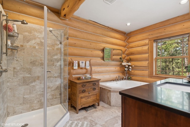 bathroom featuring rustic walls, vanity, and shower with separate bathtub