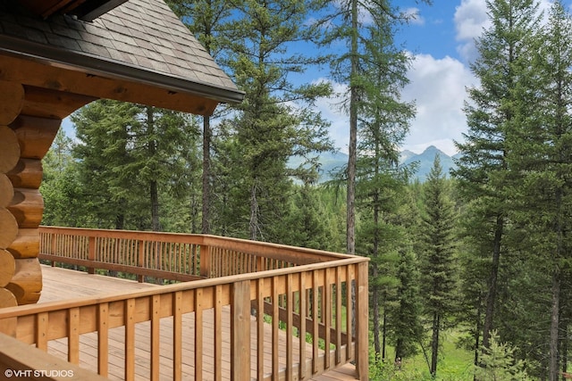 wooden terrace with a mountain view