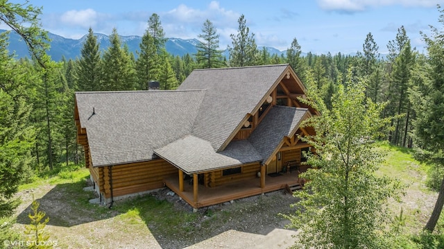 birds eye view of property with a mountain view