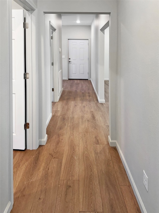 hall featuring hardwood / wood-style flooring