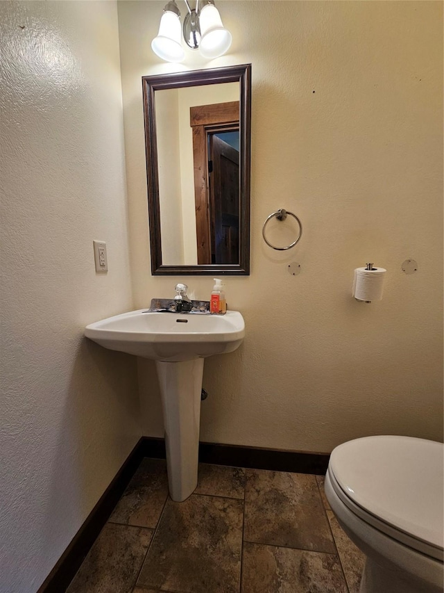 bathroom featuring toilet