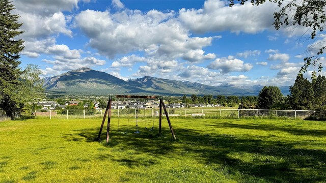 mountain view featuring a rural view