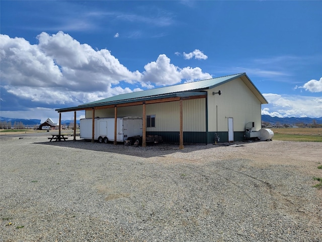 view of outdoor structure featuring a mountain view