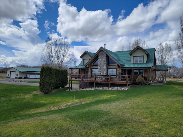 rear view of property with a lawn