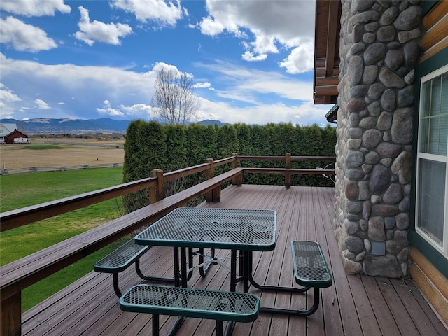 wooden deck featuring a mountain view