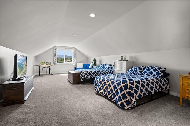 bedroom with lofted ceiling and carpet