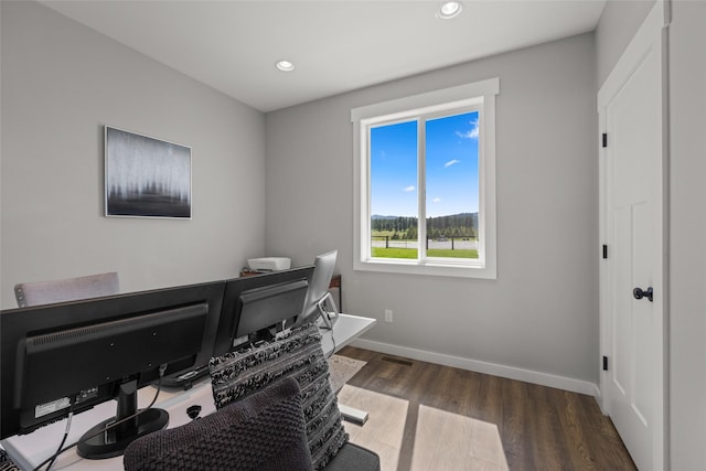 office area with dark hardwood / wood-style flooring