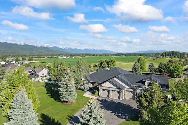 birds eye view of property featuring a mountain view