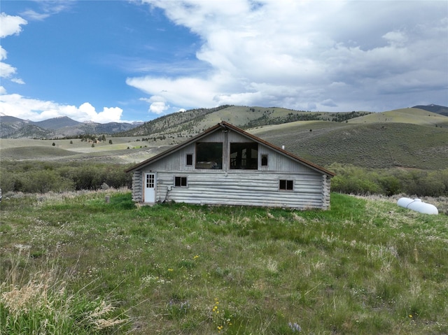 exterior space featuring a mountain view and a rural view