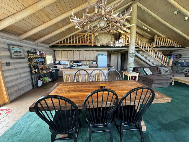 dining room featuring wood ceiling, high vaulted ceiling, rustic walls, and beamed ceiling