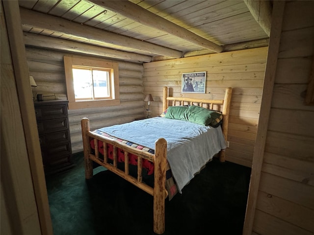 carpeted bedroom with beam ceiling, log walls, and wood ceiling